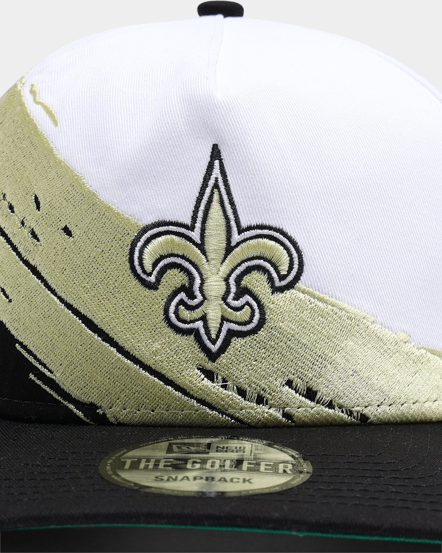New Era New Orleans Saints Paint Stripe Old Golfer Snapback Paint Brush